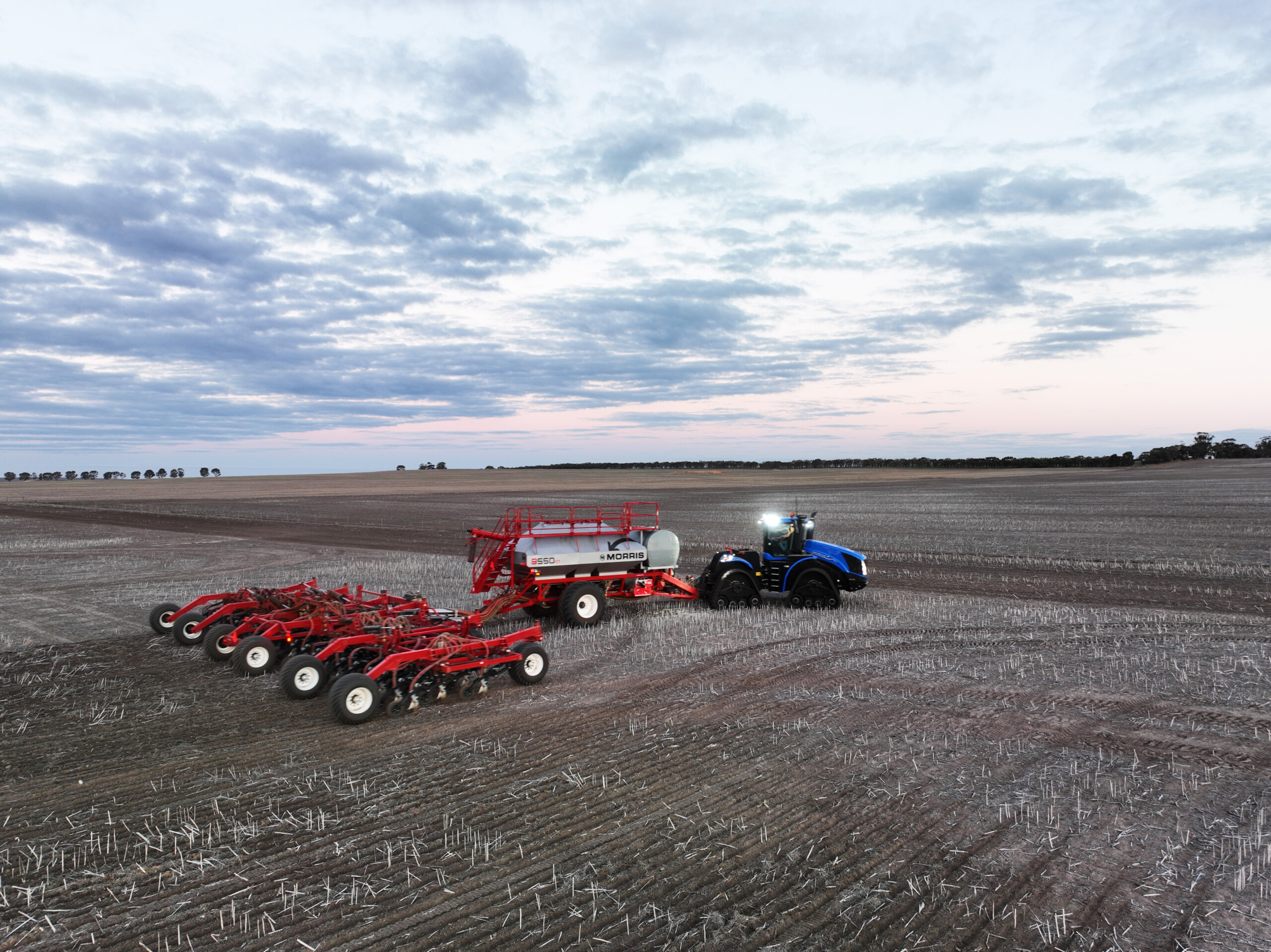Morris 9 Series Air Cart working with a sunset in the background